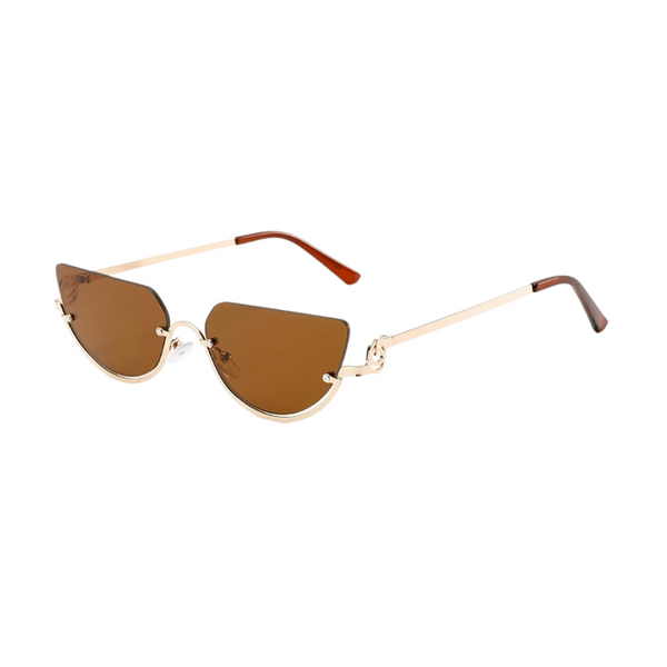 Eleve seu estilo com os Óculos de Sol Lírio Proteção UV-400, um acessório que une sofisticação e segurança para os seus olhos. Com design minimalista e armação leve, este modelo inspirado no luxo retrô destaca-se pelo charme e modernidade. As lentes de alta qualidade garantem proteção UV-400, bloqueando os raios nocivos do sol e proporcionando conforto visual inigualável. 