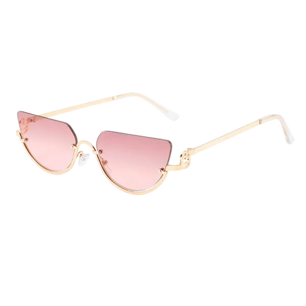 Eleve seu estilo com os Óculos de Sol Lírio Proteção UV-400, um acessório que une sofisticação e segurança para os seus olhos. Com design minimalista e armação leve, este modelo inspirado no luxo retrô destaca-se pelo charme e modernidade. As lentes de alta qualidade garantem proteção UV-400, bloqueando os raios nocivos do sol e proporcionando conforto visual inigualável. 